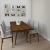 a dining room table with chairs