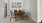 a dining room table with chairs