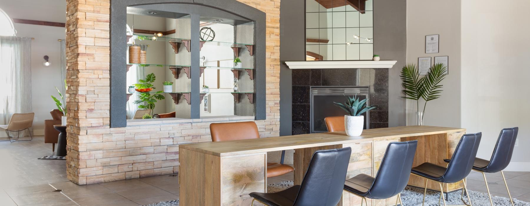 a lounge with a fireplace