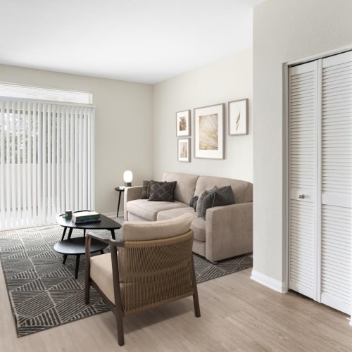 Spacious and well-lit living spaces a living room with a couch and a table