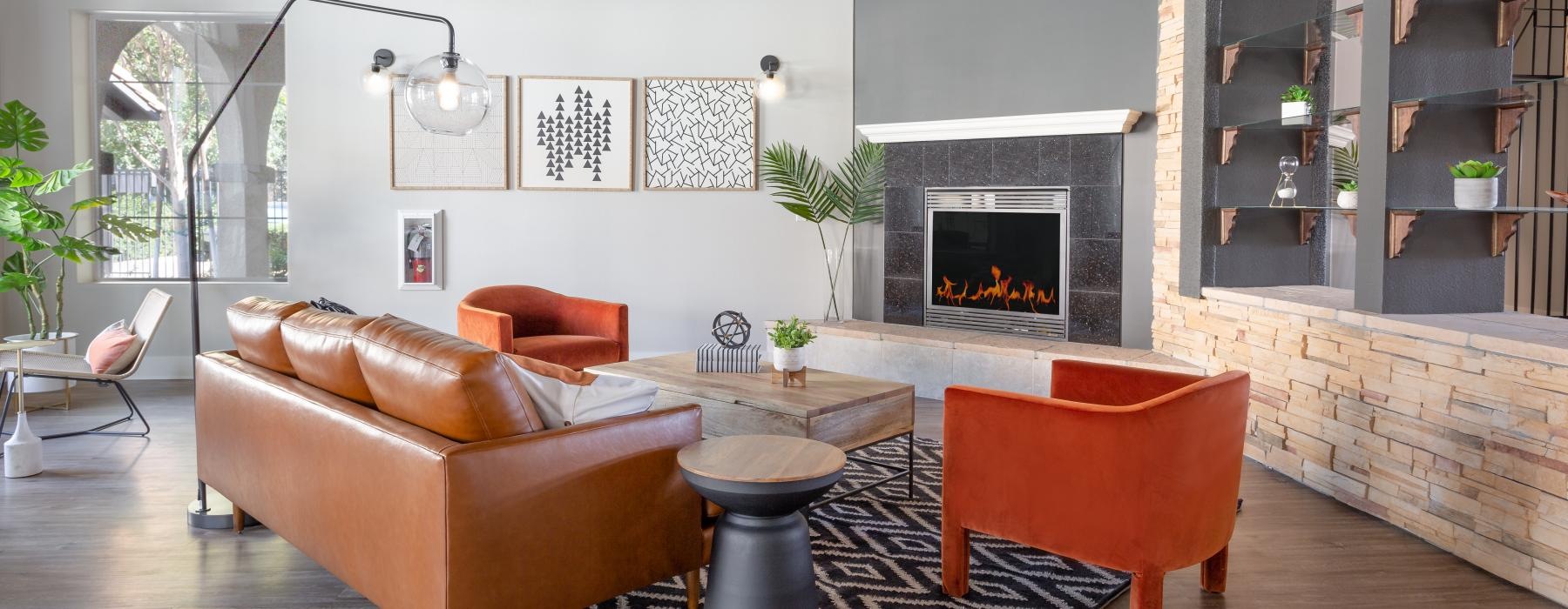 a lounge with a fireplace