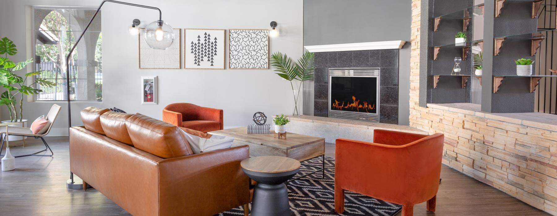 a lounge with a fireplace